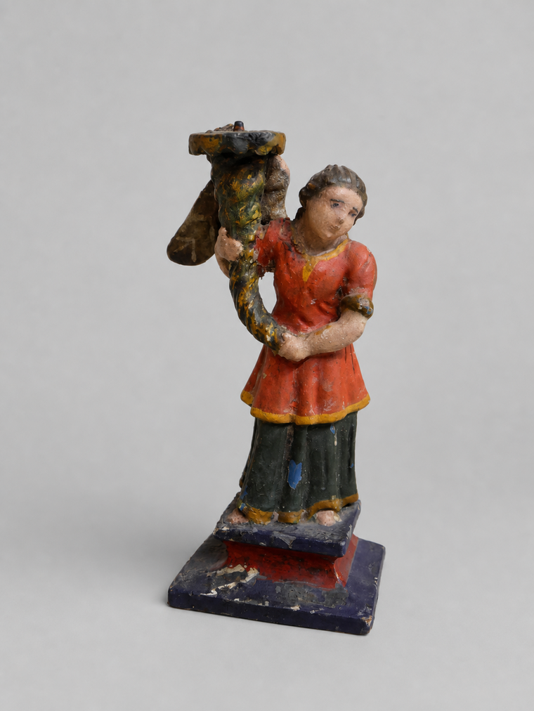 Hölzerner Figurenkerzenwandleuchter