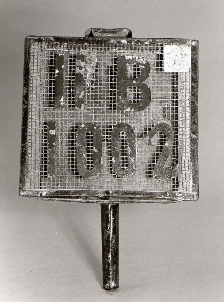 Autonummernschild mit Kerzenlaterne